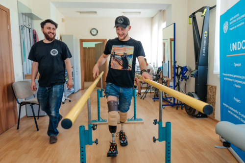 Man with prosthetics walking